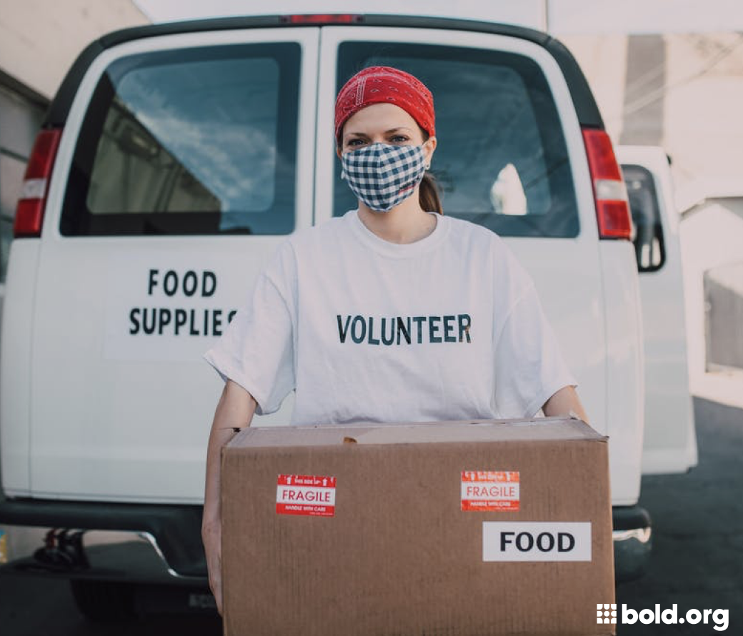 Volunteer delivering food and supplies