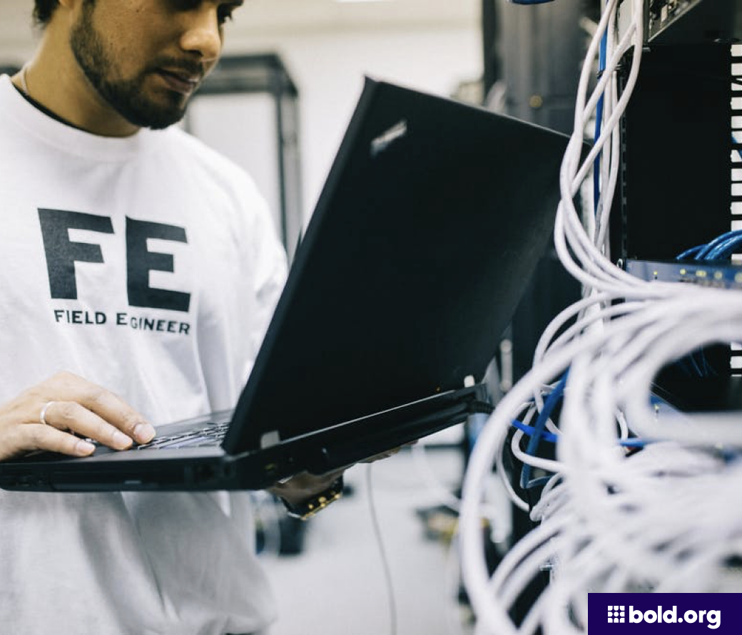 Engineer holding a computer