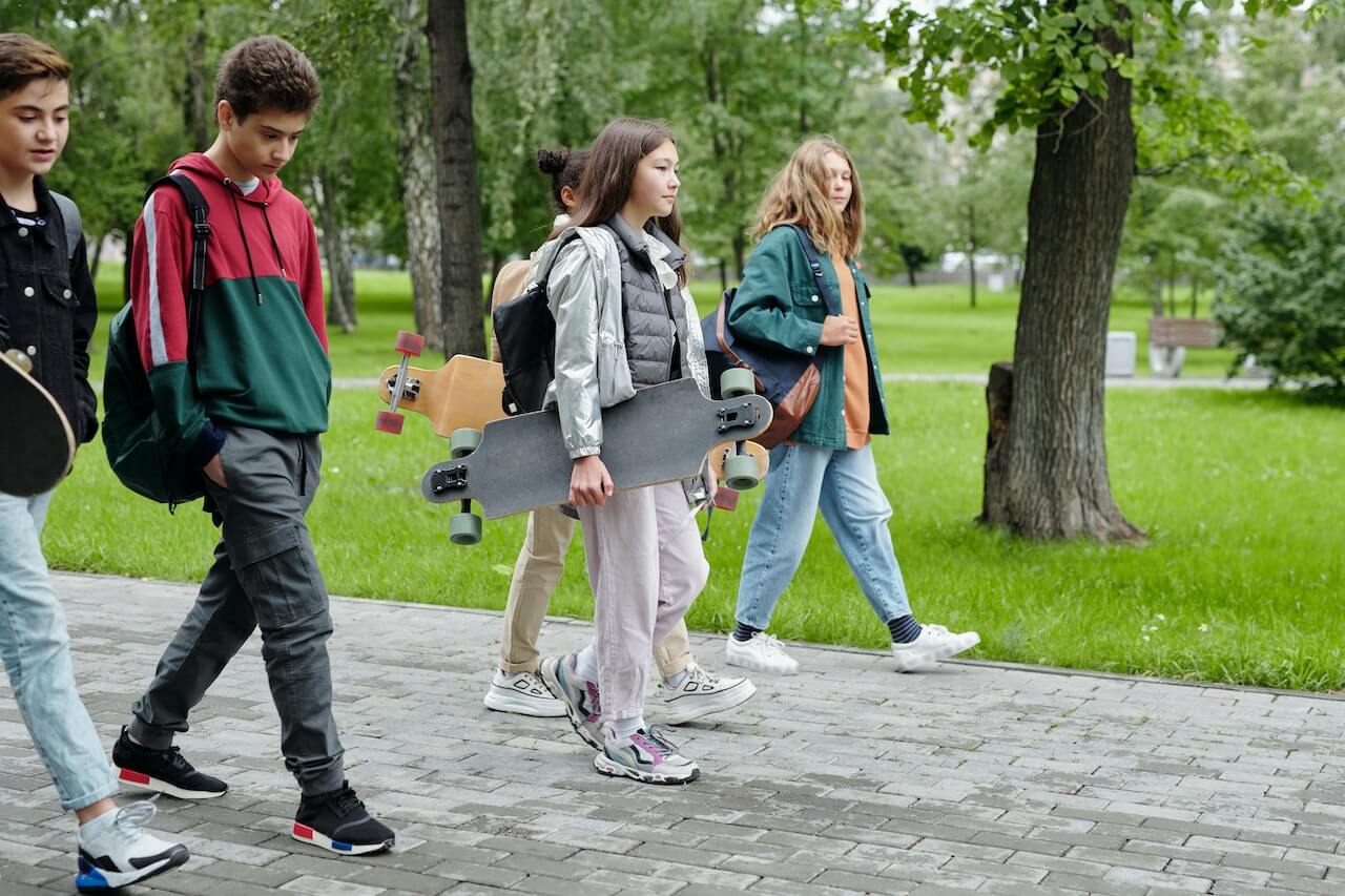 Students walking outdoors on their school campus