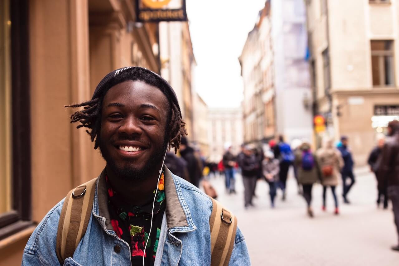 exchange student smiles in street