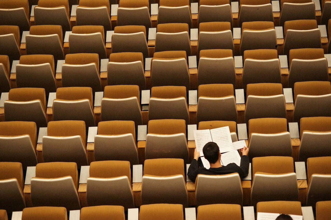 student studying in lecture hall