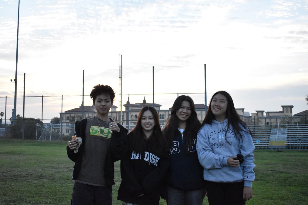 graduate students on a field