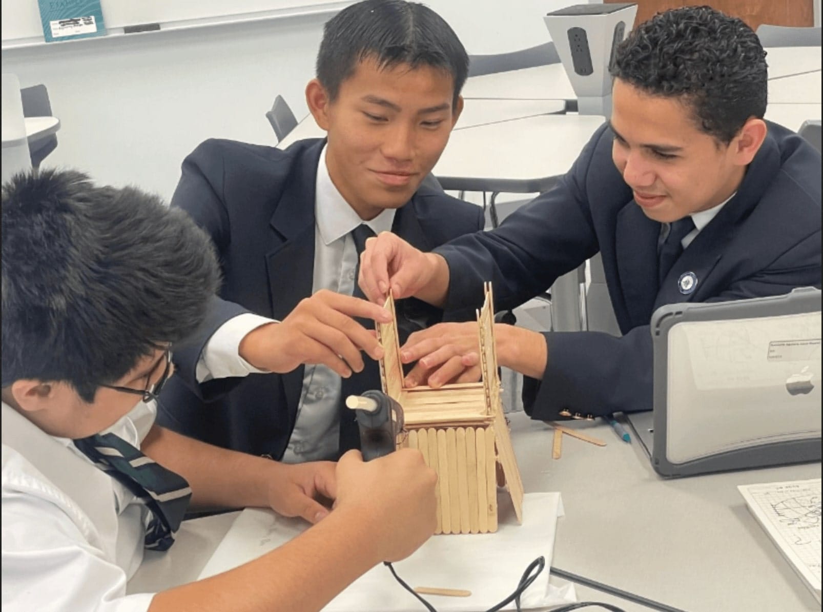 Duke students working on mechanical engineering exercise