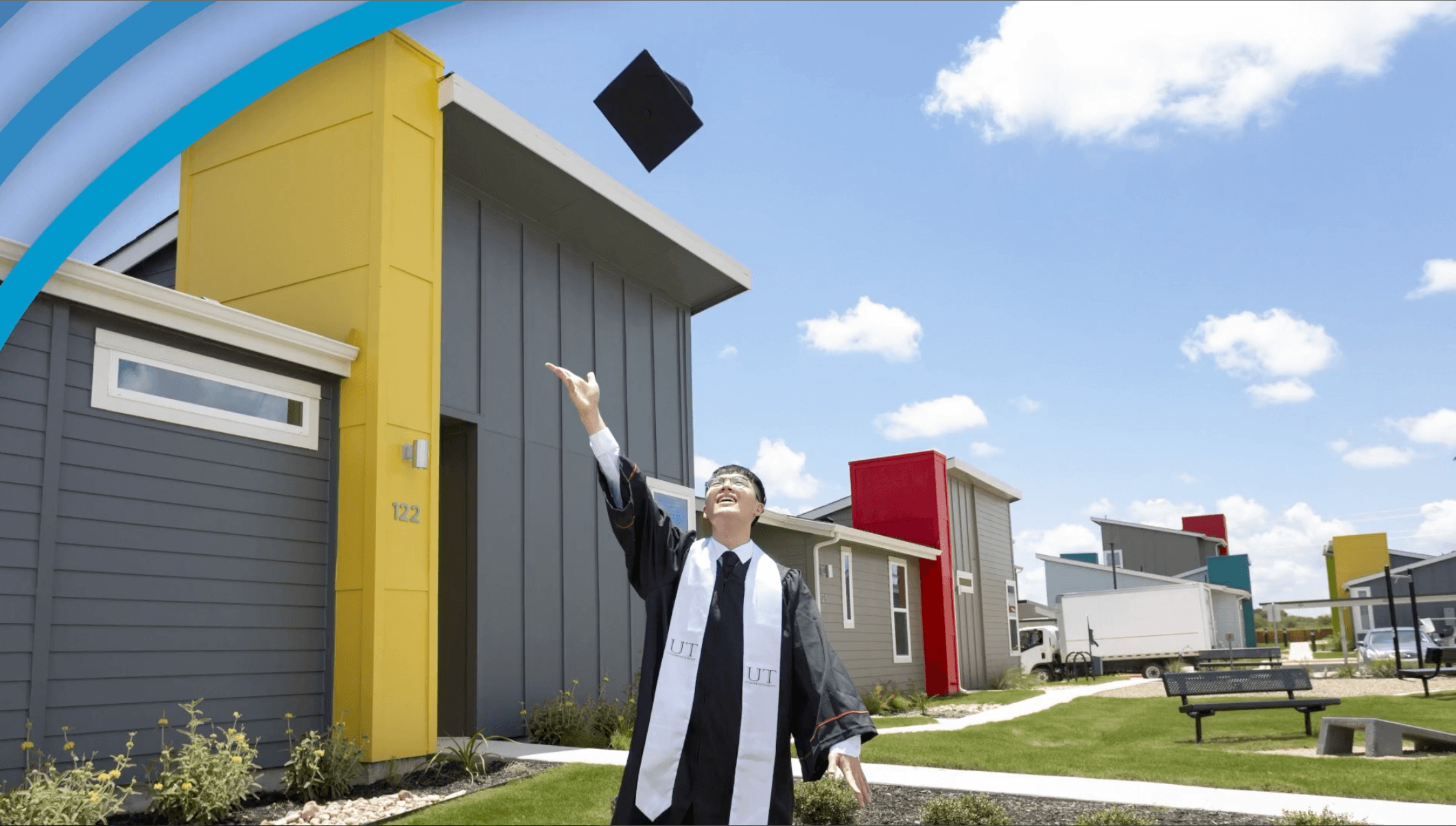 Dell Scholar graduates and throws cap in the air